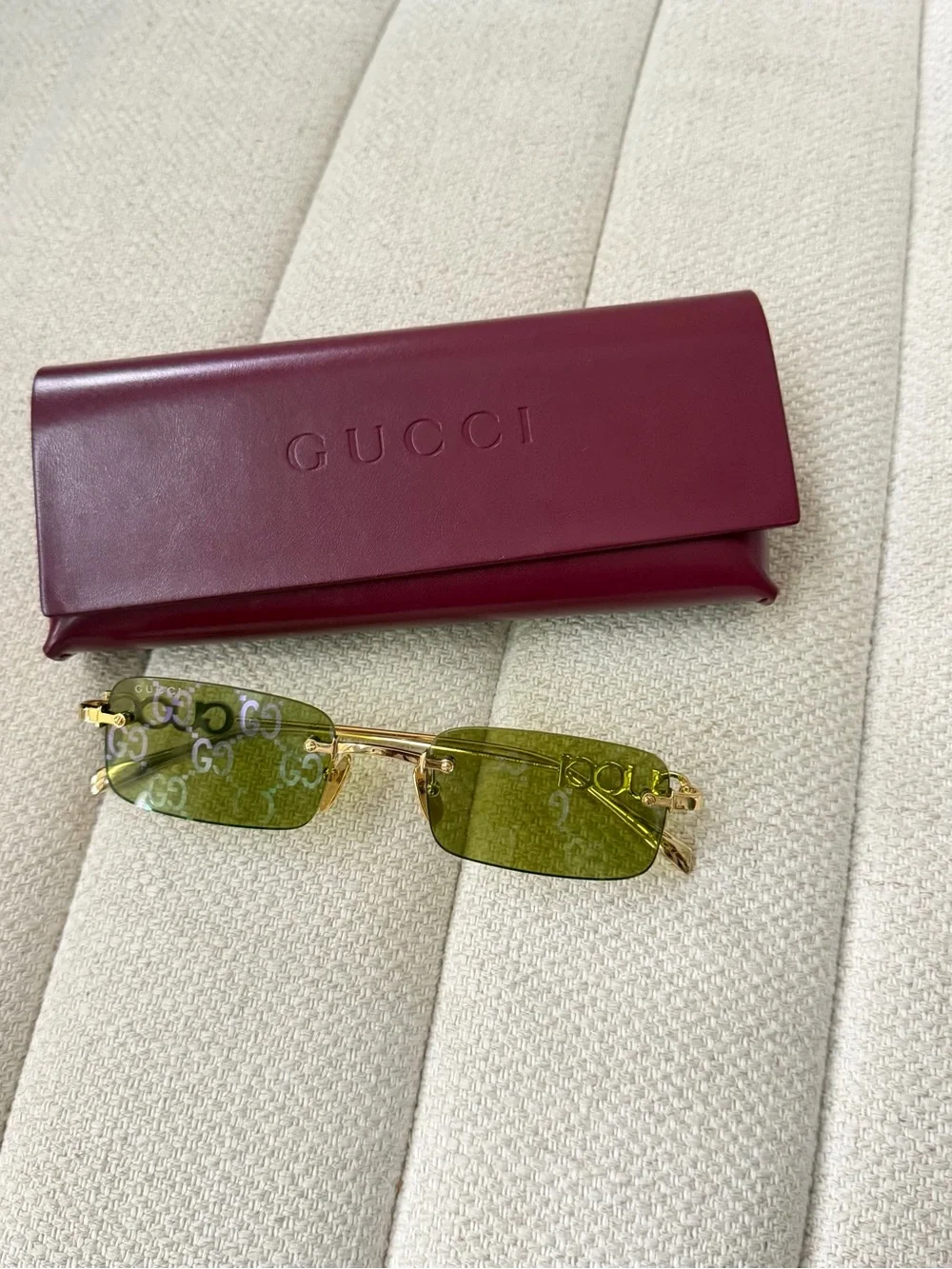 Gucci women’s Rimless Logo Sunglasses in Green